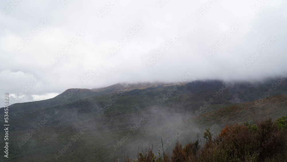 Hiking in bad weather on the Tongariro Alpine Crossing in New Zealand. Hiking in bad weather on the Tongariro Alpine Crossing in New Zealand.