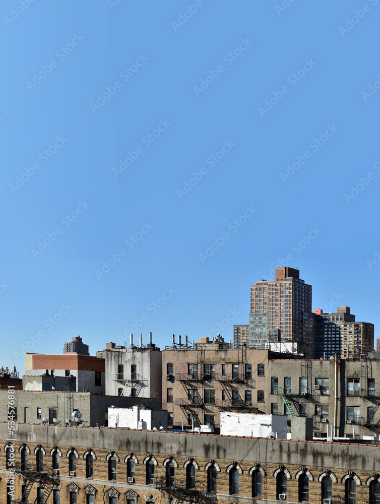 Spanish Harlem New York City building on a clear blue sky day