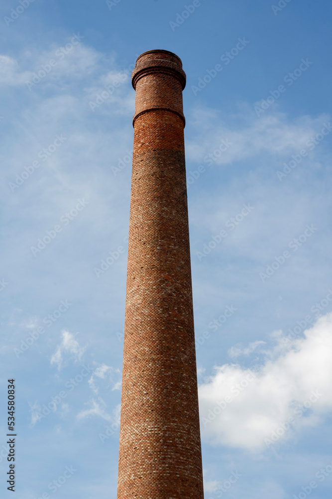 brick chimney over blue sky