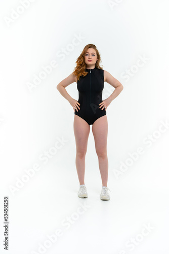 model size posing bodysuit on white background