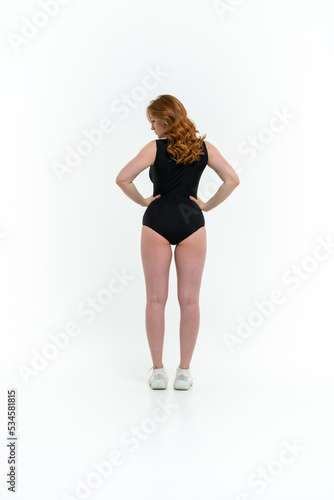 model size posing bodysuit on white background