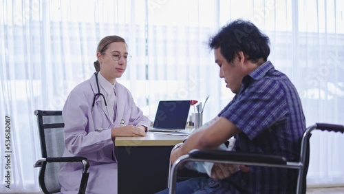 Caucasian Woman doctor talking consultant describe treatment of broken arm bone to patient man in hospital. service with modern medical technology. explain care. Concept medical care orthopedic