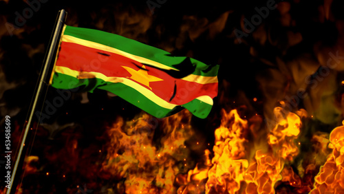 flag of Suriname on burning fire bg - hard times concept - abstract 3D illustration
