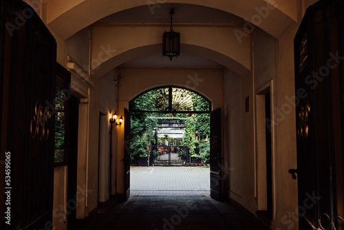 Biophilic Design, biophilia in city street, connecting people and nature. Biophilic Design Restaurant with Green plants and trees. Street Cafe botanical garden outdoor.