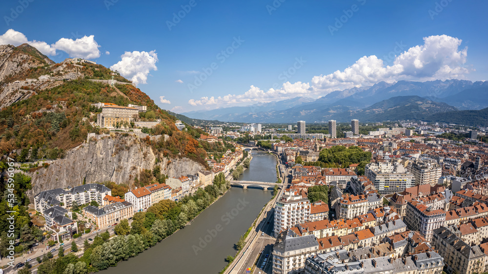 The drone panoramic aerial view of hill and fortress of the Bastille, and Grenoble city, France.