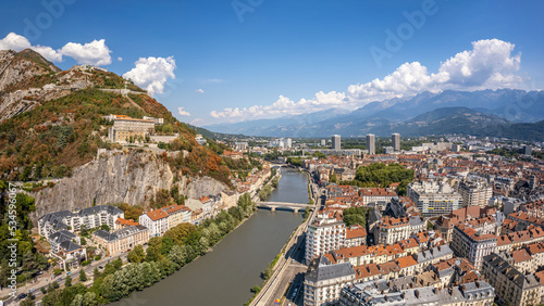 The drone panoramic aerial view of hill and fortress of the Bastille, and Grenoble city, France. photo