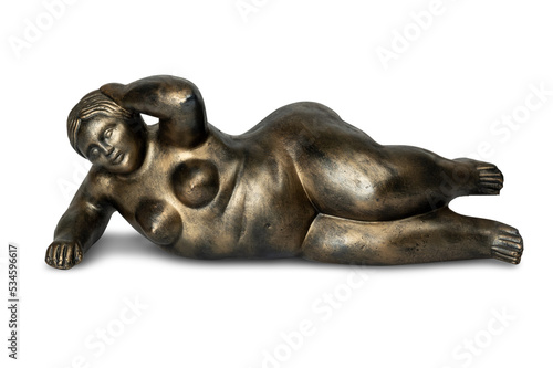 Pequena estátua de artesanato no estilo Botero, da Colombia. Figura de mulher gorda. photo