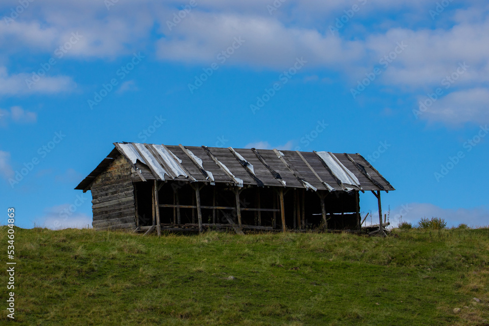 An abandoned hut on a hill An abandoned hut on a hill