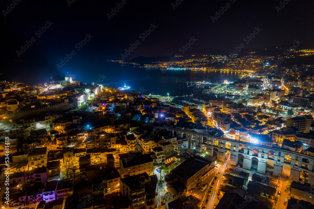 Fototapeta premium Aerial view the city of Kavala at night, in northern Greece
