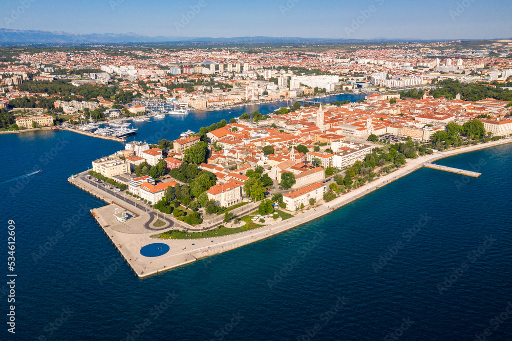 Aerial shot of Zadar old town, famous tourist attraction in Croatia. Waterfront aerial summer view, Dalmatia region of Croatia.