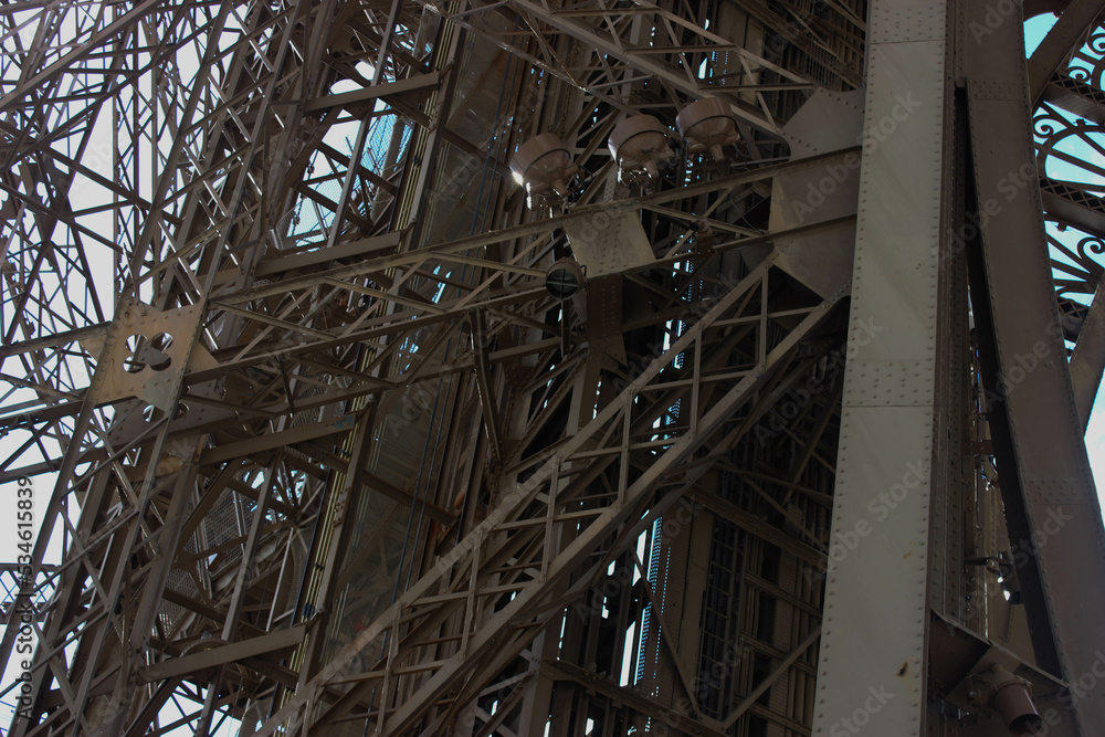 Obraz premium The iron construction of the Eiffel tower. Details of the construction of the Eiffel tower