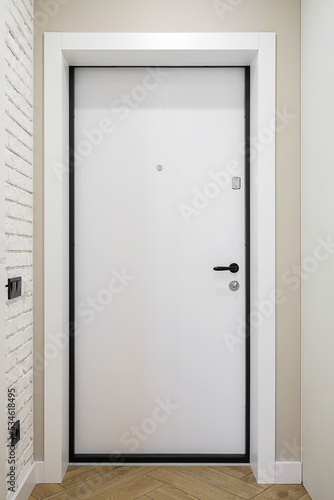 White front door inside the house