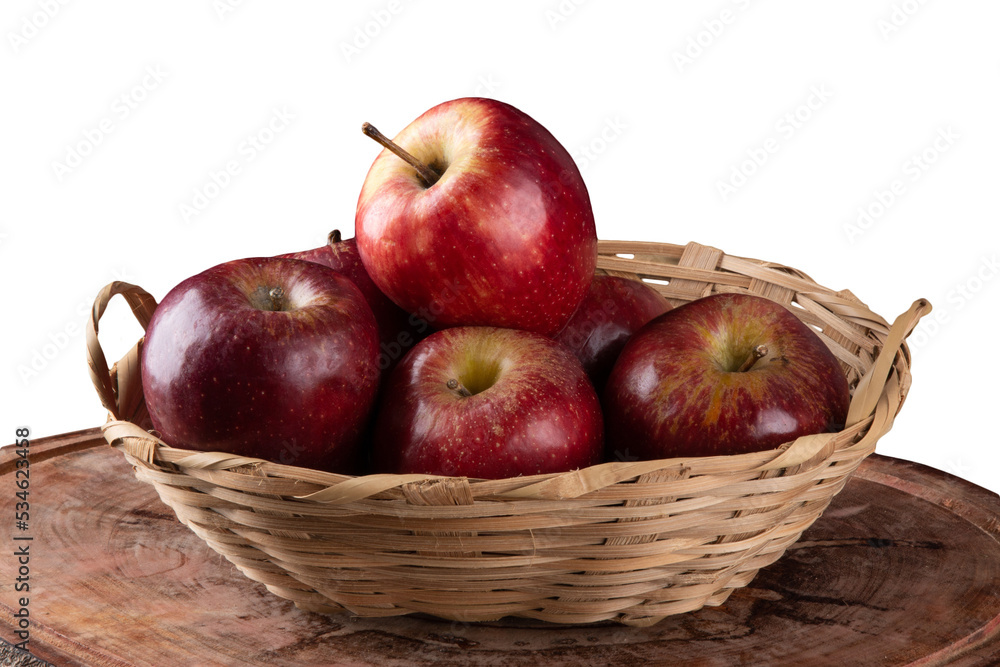 Red apples in basket with wooden background. Red apples in basket with wooden background.