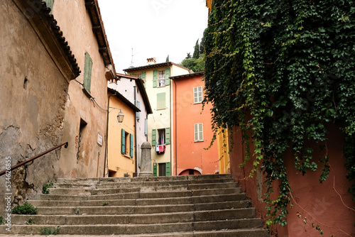 Fototapeta Naklejka Na Ścianę i Meble -  Photo of ancient steps leading to courtyard behind traditional Italian homes in the medieval city of Brisighella, Emilia-Romagna, Italy