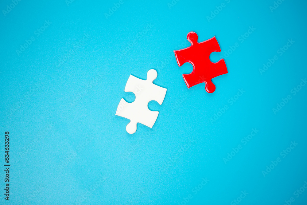 White part of jigsaw puzzle pieces on blue background. concepts of problem solving, business success, teamwork, Team playing jigsaw game incomplete, Texture photo with copy space for text White part of jigsaw puzzle pieces on blue background. concepts of problem solving, business success, teamwork, Team playing jigsaw game incomplete, Texture photo with copy space for text