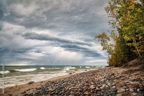 USA, Michigan, Munising, Receding storm clouds at Pictured Rocks National Lak...