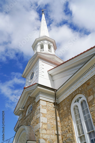 low angle view of ancient church tower against blue sky