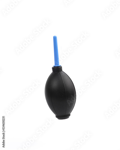 Enema for blowing dust from photographic equipment levitating on white background