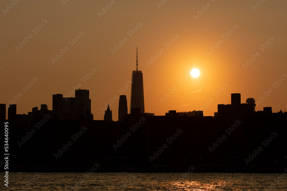 Lower Manhattan skyline sunset silhouette