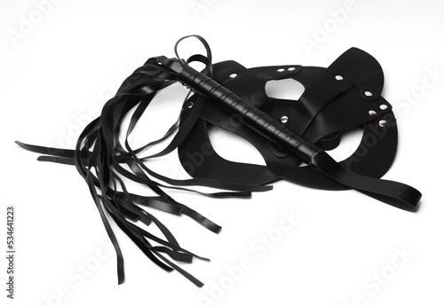 Leather whip with a mask isolated on a white background. BDSM set. Sex games