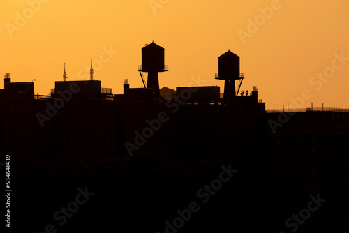 Water tower skyline silhouette at sunset