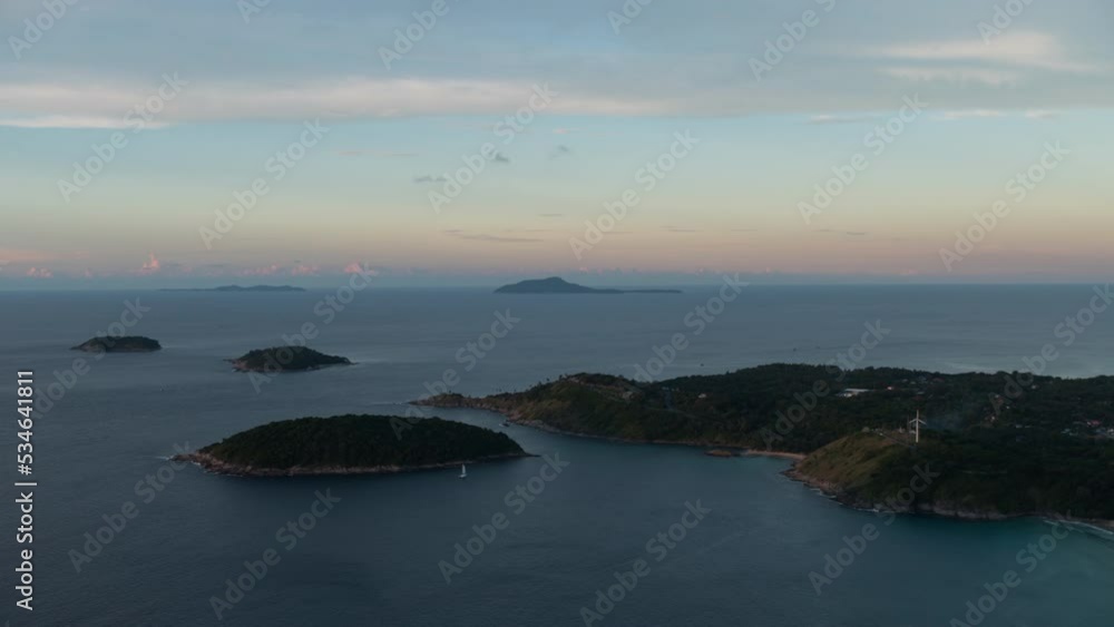 Timelapse phuket island during sunrise time coastline panorama 4k at viewpoint black rock pha-hin-dam thailand