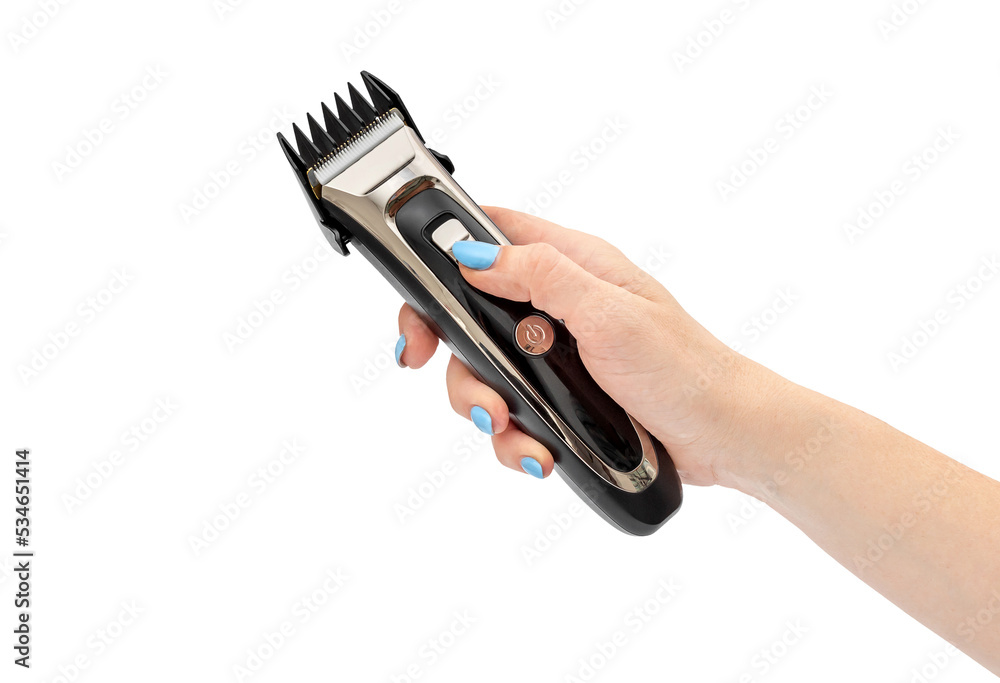 Obraz premium Woman's hand holding accumulator clipper. Isolated on white.