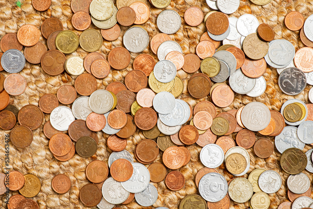 different coins on the white background different coins on the white background