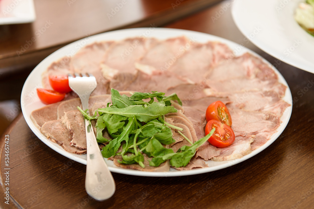 Salads are varied on the festive table. Delicious food to treat guests. Salads are varied on the festive table. Delicious food to treat guests.
