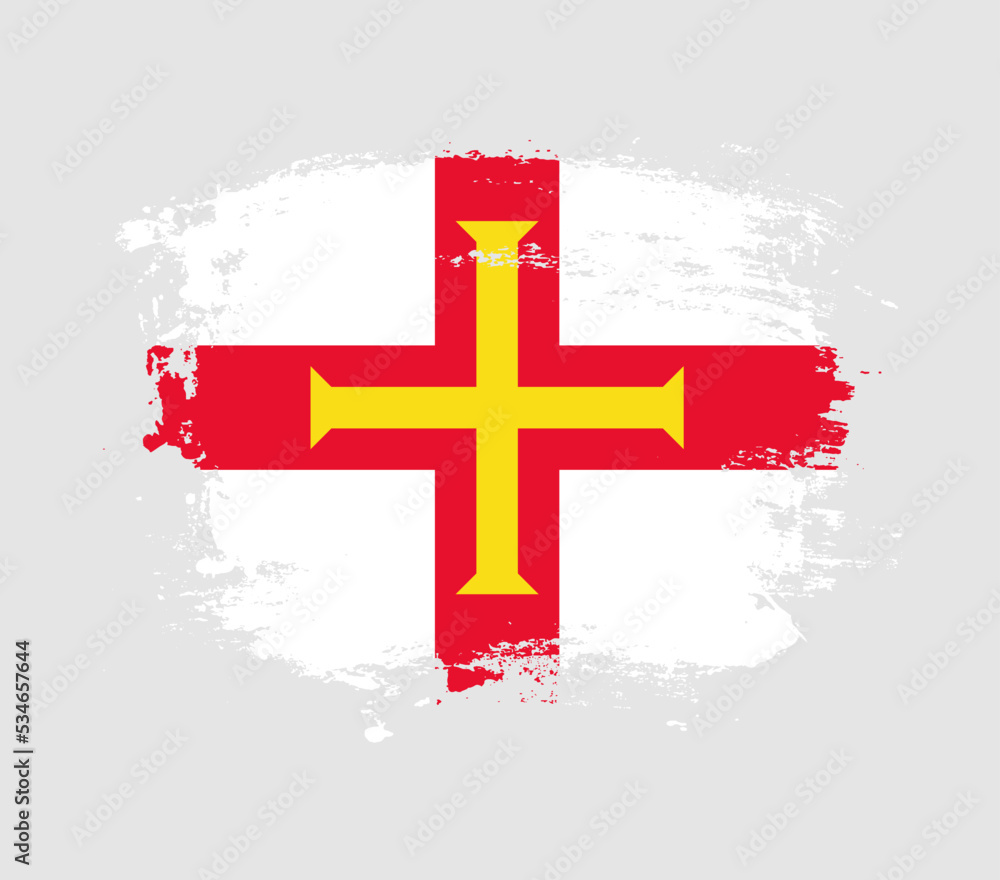 Elegant grungy brush flag with Guernsey national flag vector Elegant grungy brush flag with Guernsey national flag vector