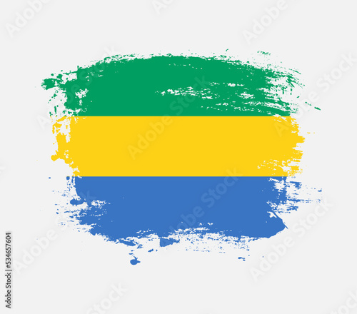 Elegant grungy brush flag with Gabon national flag vector