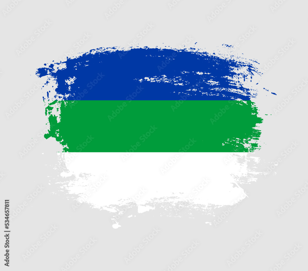 Fototapeta premium Elegant grungy brush flag with Komi Republic national flag vector