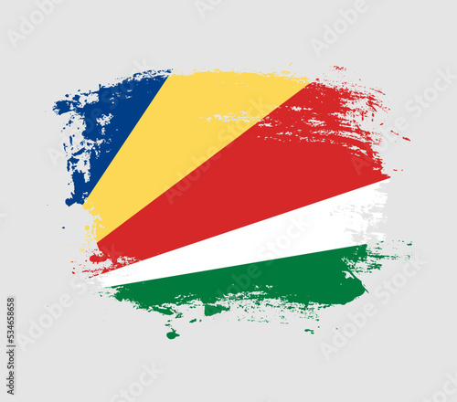 Elegant grungy brush flag with Seychelles national flag vector