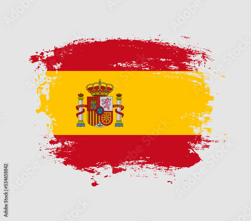 Elegant grungy brush flag with Spain national flag vector