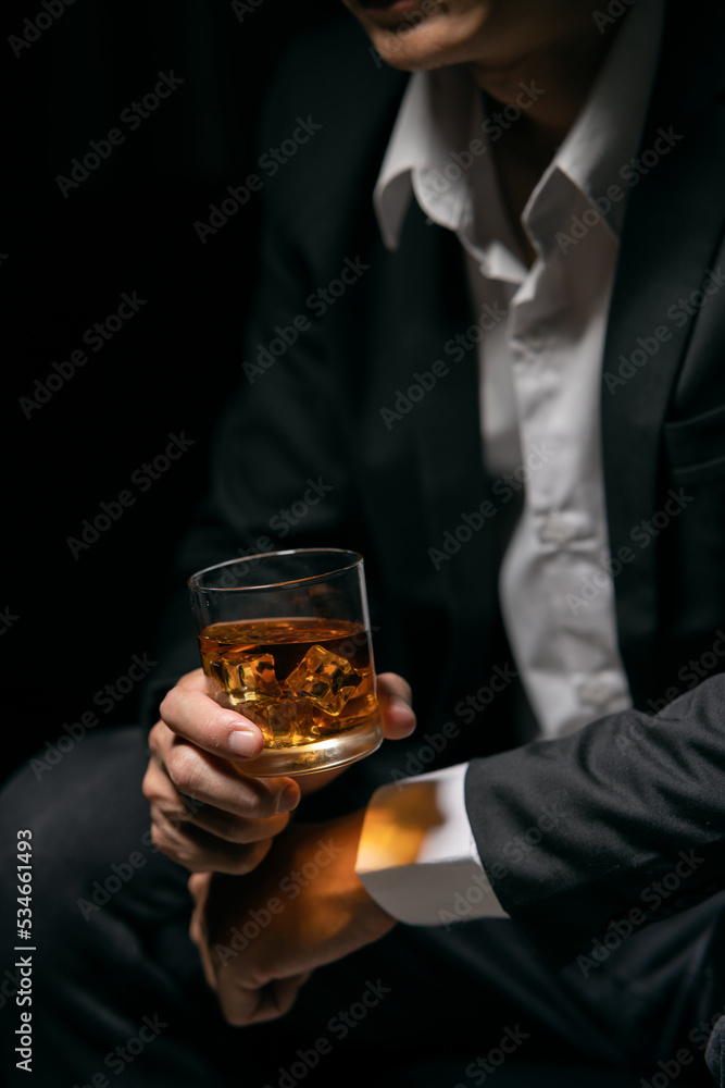 Businessmen in suits drinking Celebrate whiskey Businessmen in suits drinking Celebrate whiskey
