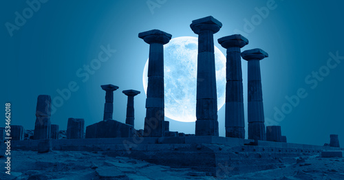 Ruins of ancient city Assos with temple of Athena Full Moon in the background - Canakkale, Turkey "Elements of this image furnished by NASA "