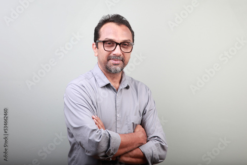 Fotografie Portrait of a middle aged happy man of Indian origin