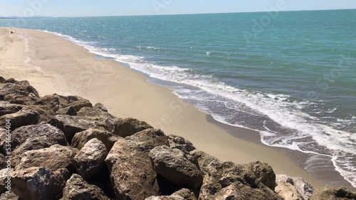 Viareggio beautiful panoramic view from pier of touristic port of sea and long sand beach at sunny day Viareggio, Tuscany, Italy.