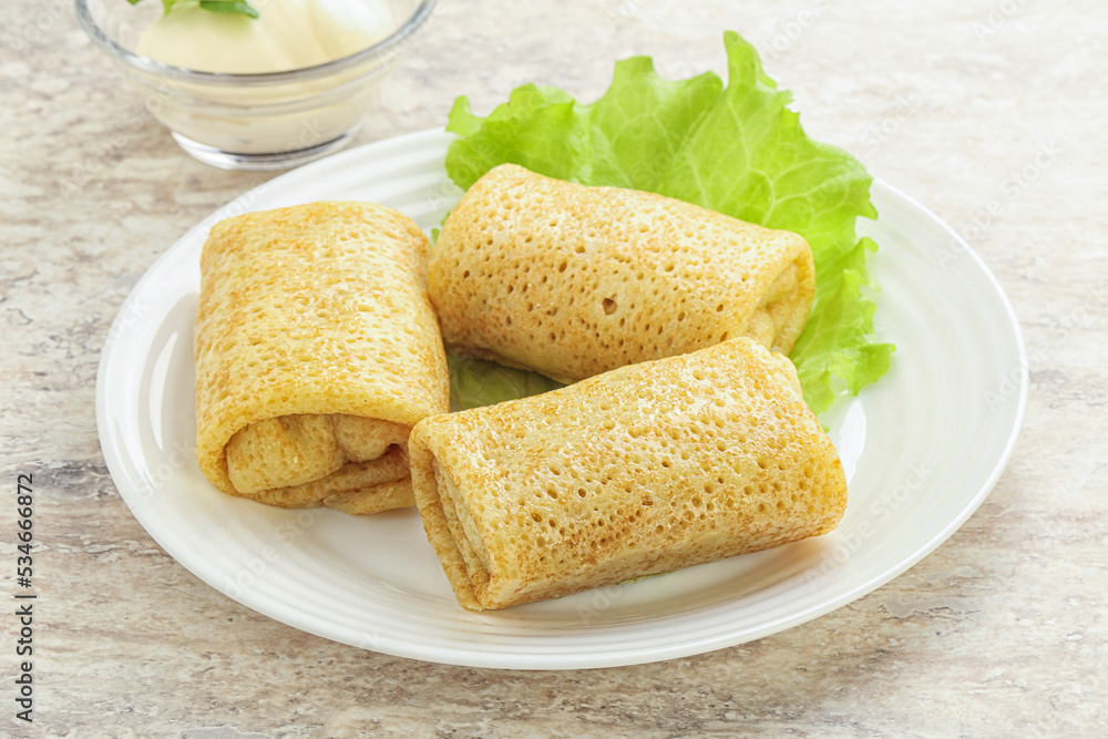 Stuffed pancakes with meat and cream Stuffed pancakes with meat and cream