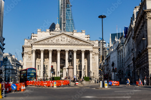 The Royal Exchange and The Bank of England against skyscrapers in the City of London a sunny day photo