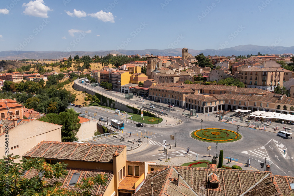 Segovia town view at Plaza del Azoguejo and the ancient Roman aqueduct. Spain 