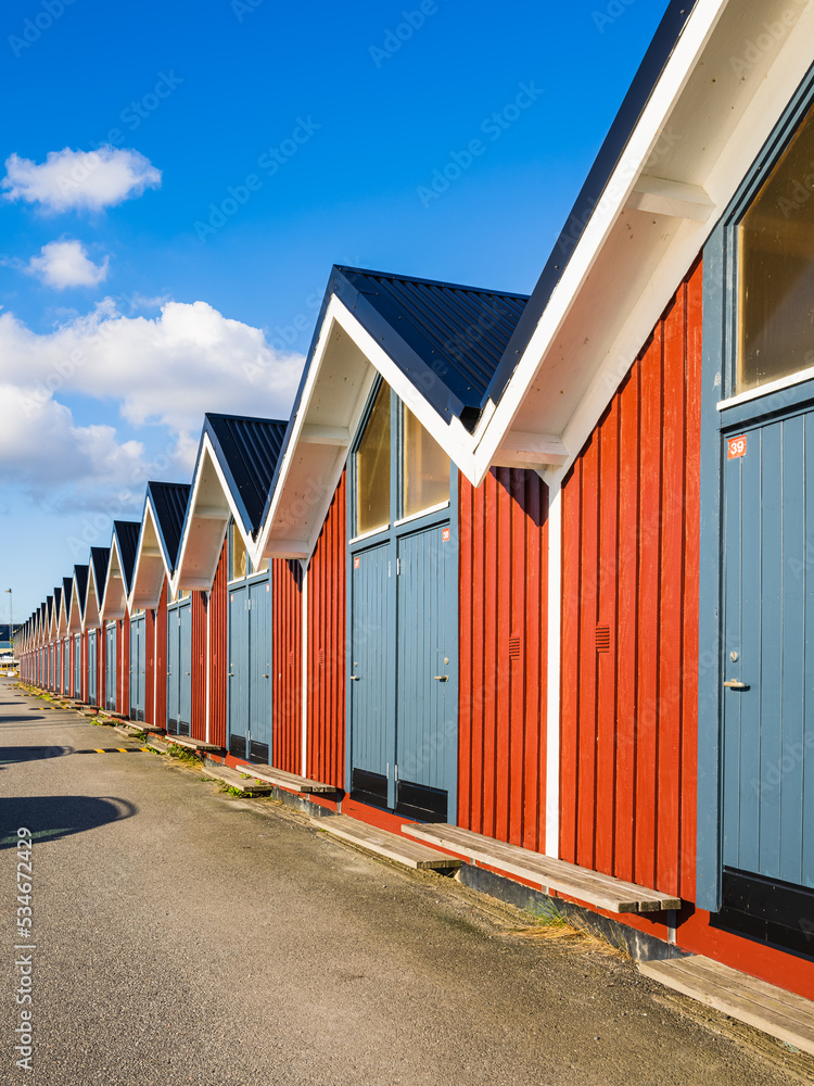 Fototapeta premium Red sea cottages in a row
