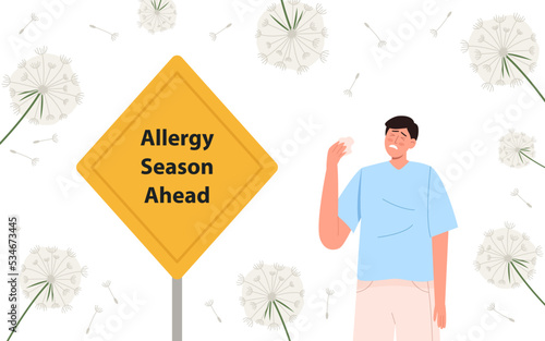 Man with pollen allergy near Yellow sign
