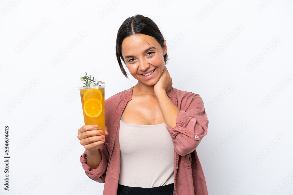 Young hispanic woman holding a cocktail isolated on white background laughing Young hispanic woman holding a cocktail isolated on white background laughing