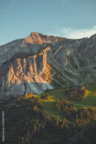 sunset in austria Alps in hohe tauern mountains, golden light in the mountains in Obertauer town