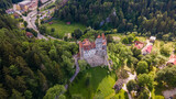 Aerial photography over Bran castle in Brasov, Romania. Photography was shot from a drone at a higher altitude with camera pointing downwards for a top view.