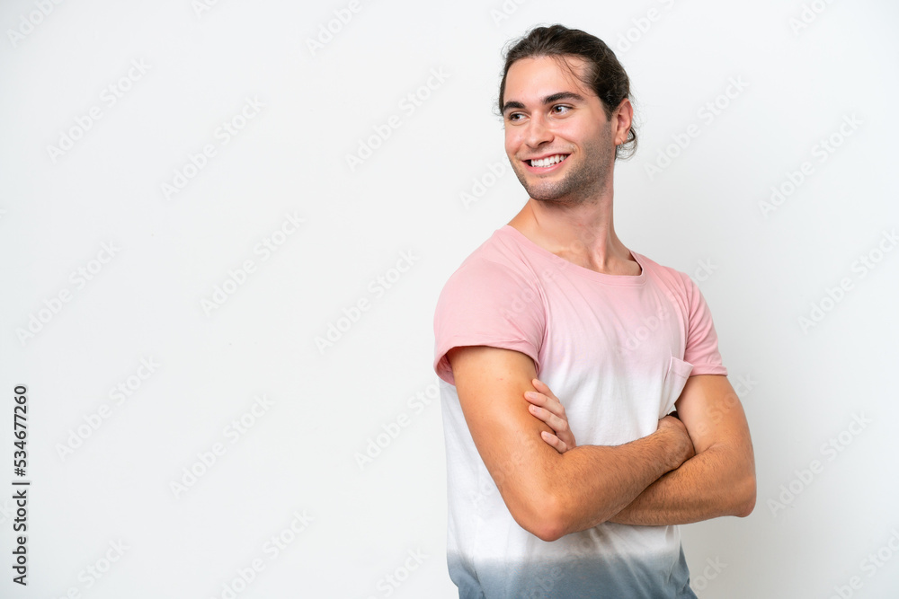 Obraz premium Caucasian handsome man isolated on white background looking to the side and smiling