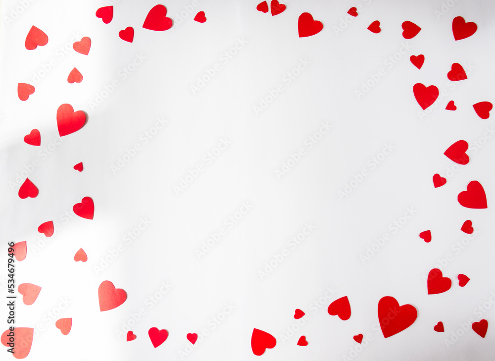 White background with red hearts around the edges. Valentine's Day card. Copy space for text. Flat lay, top view, copy space. Design for text.
