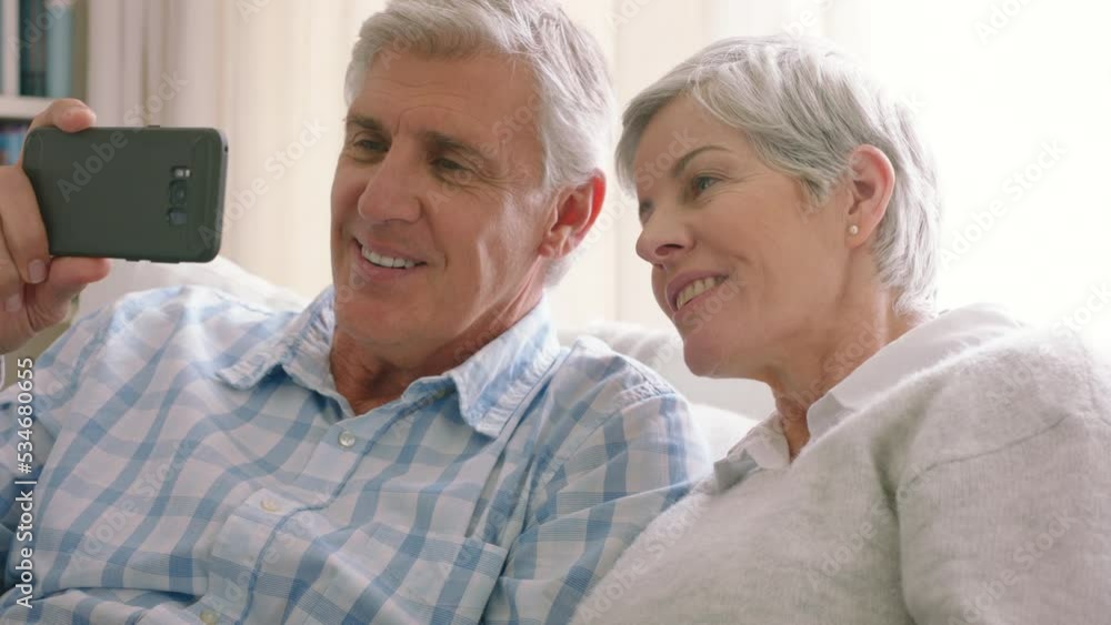 Senior couple, video call on phone and talking to family, friends and network connection online at home. Happy elderly people, digital mobile communication chat and social media internet conversation Senior couple, video call on phone and talking to family, friends and network connection online at home. Happy elderly people, digital mobile communication chat and social media internet conversation