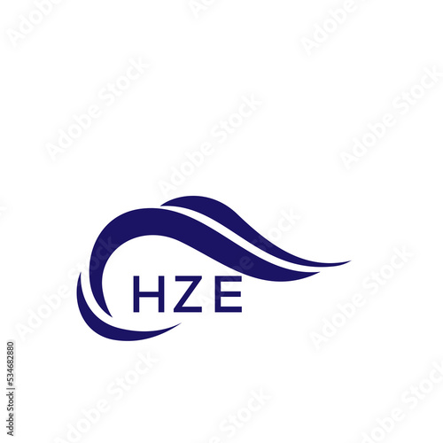 HZE letter logo. HZE blue image on white background. HZE Monogram logo design for entrepreneur and business. HZE best icon.
 photo